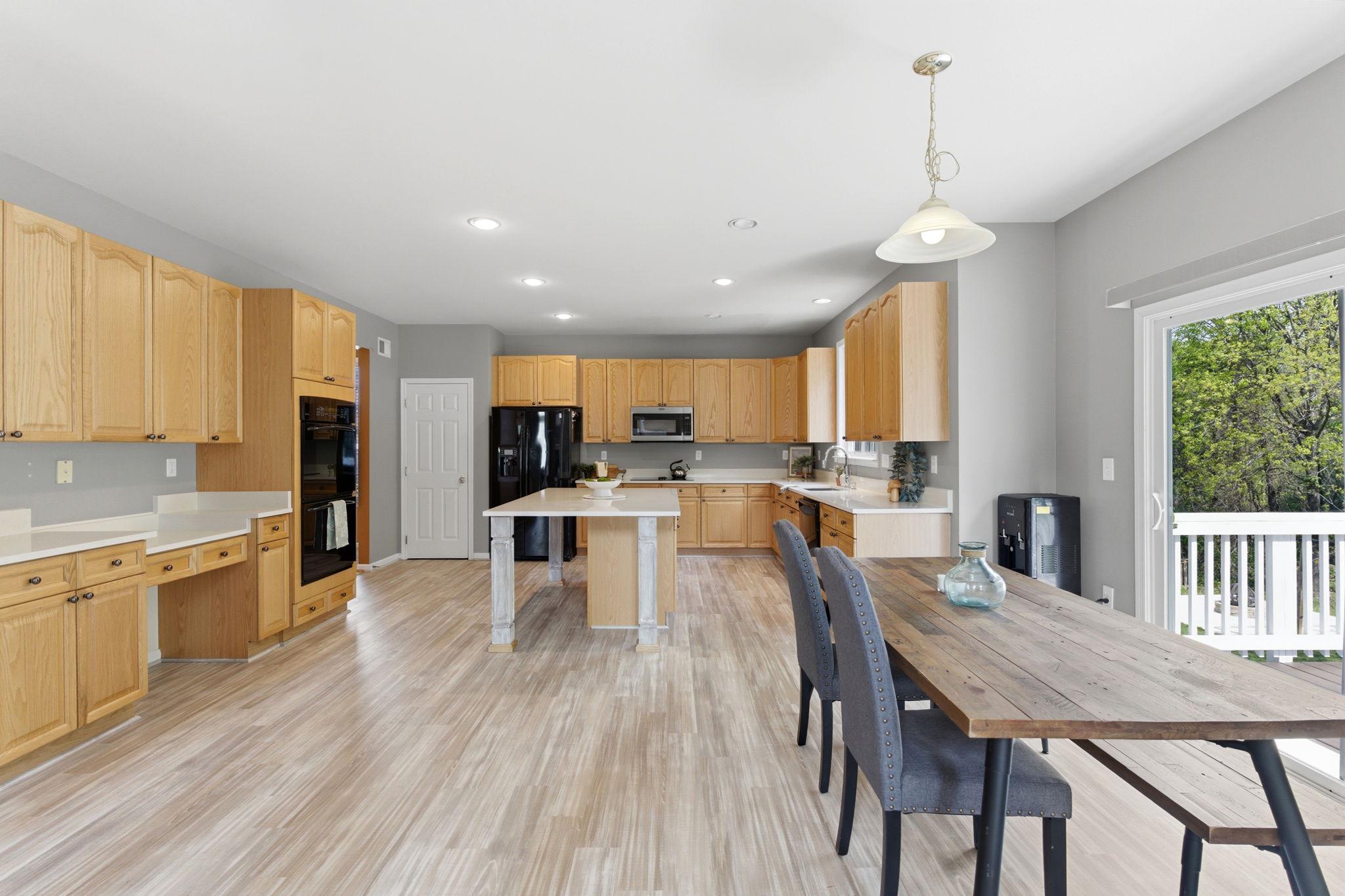 457 Hughs Road Charles Town, WV 25414 - Photo 17 of 73 Spacious kitchen with modern charm.