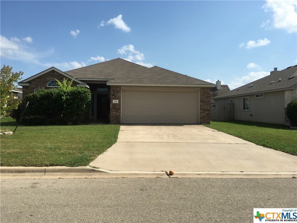 7819 Bridgepointe Drive Temple, TX 76502 - Photo 1 of 1 a front view of a house with a yard