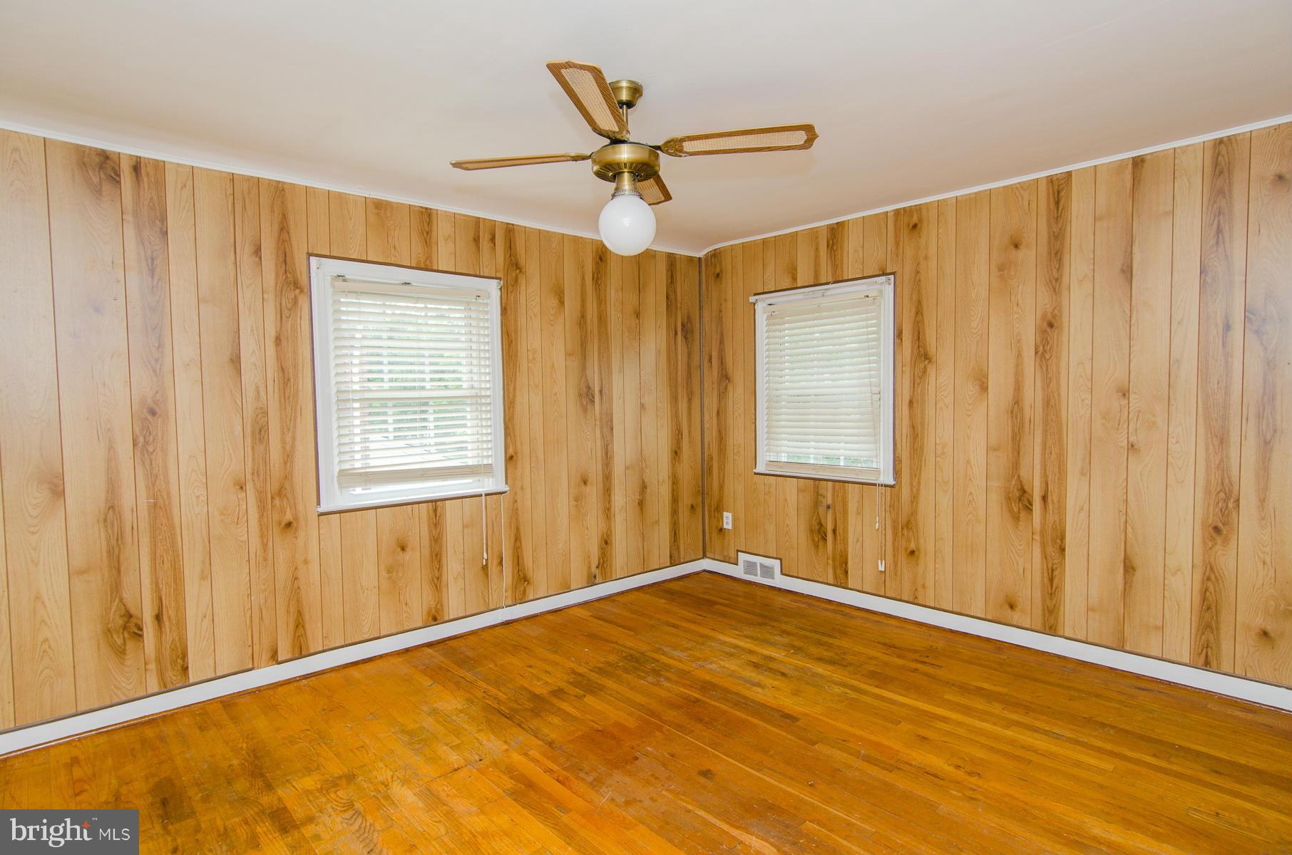1417 Stonewood Road Baltimore, MD 21239 - Photo 13 of 28 a view of a livingroom with a ceiling fan and window