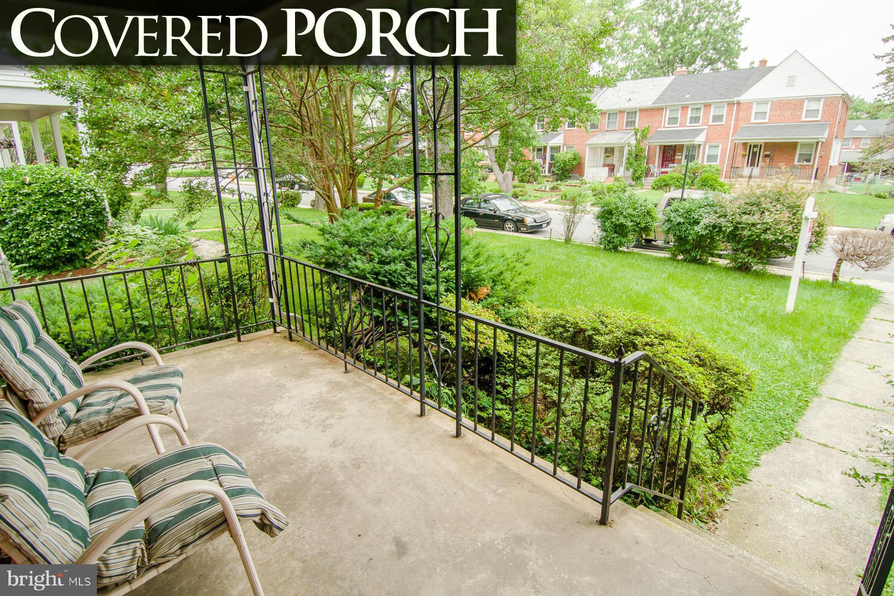 1417 Stonewood Road Baltimore, MD 21239 - Photo 24 of 28 a view of a chairs and table in backyard