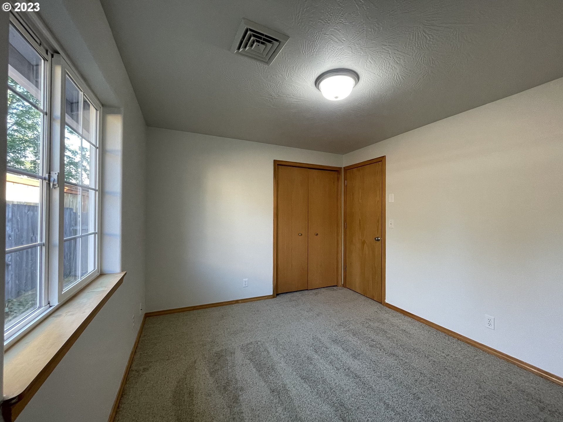 4033 Virginia Avenue Springfield, OR 97478 - Photo 19 of 29 a view of an empty room with a window
