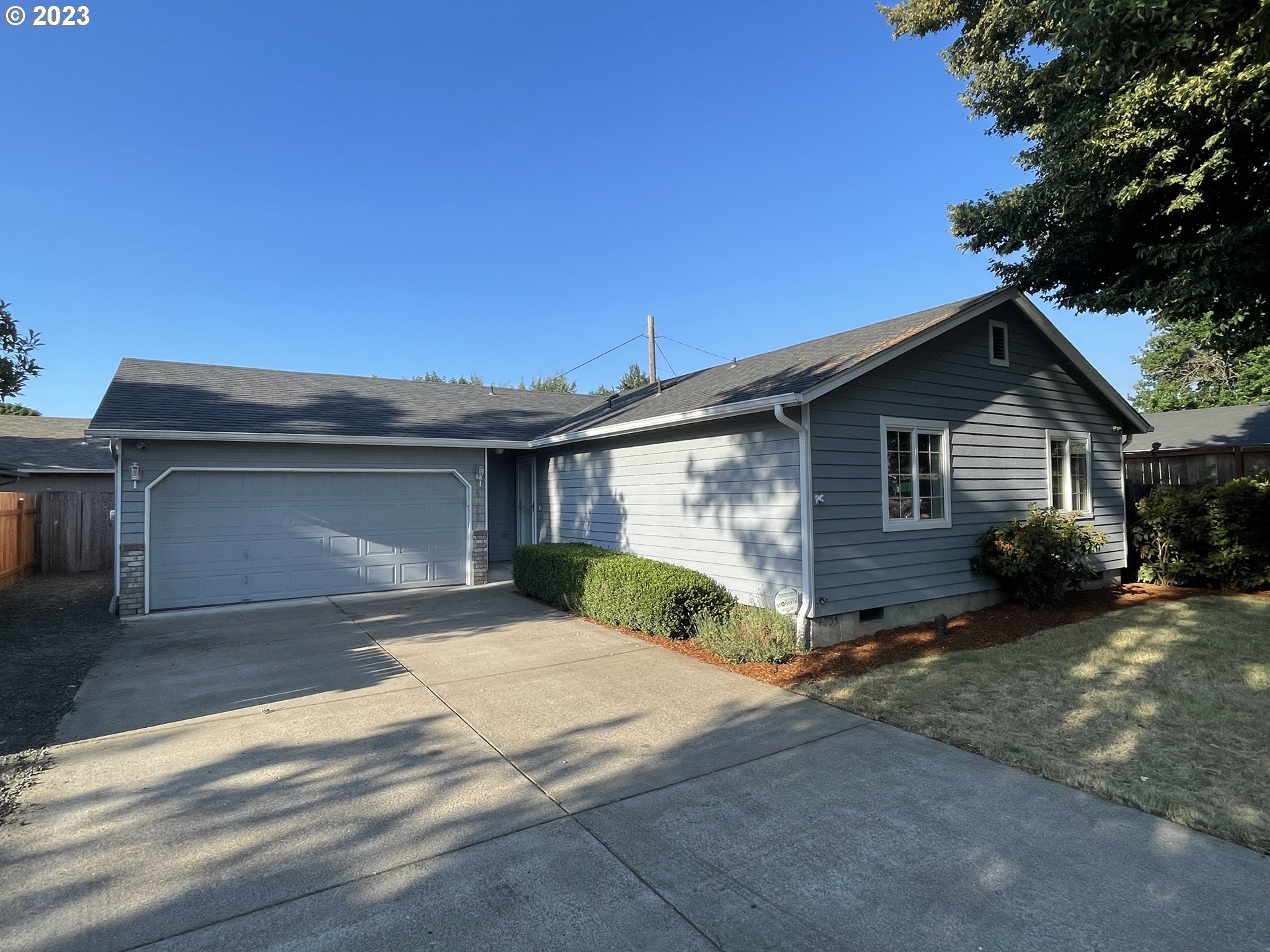 4033 Virginia Avenue Springfield, OR 97478 - Photo 29 of 29 a front view of a house with yard and parking space