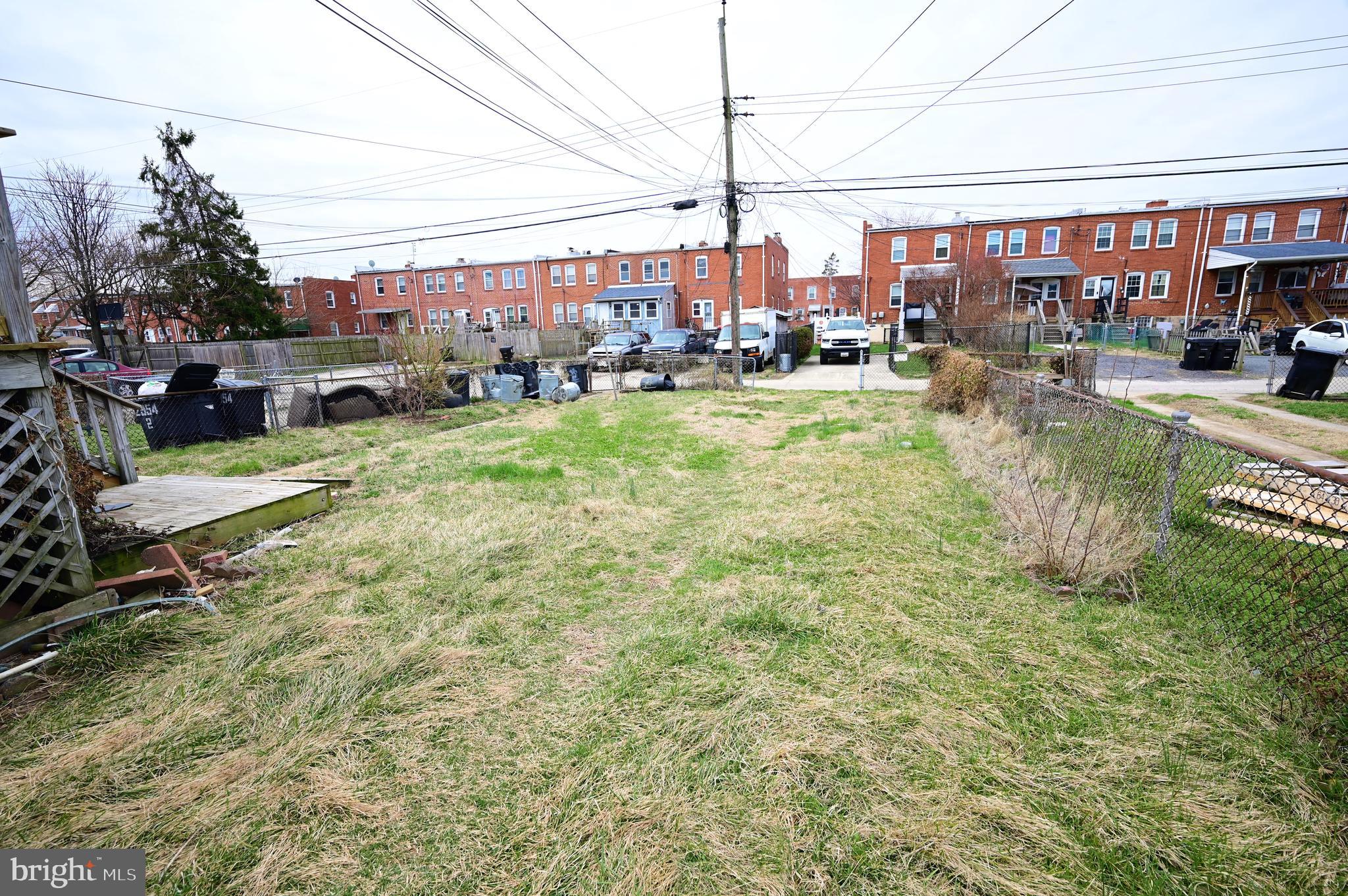 2952 Sollers Point Road, Unit B Dundalk, MD 21222 - Photo 2 of 37 a view of a street with cars parked