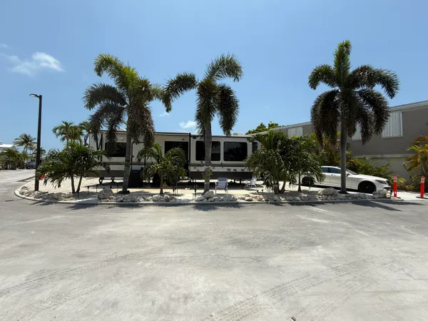a view of a street with cars on road