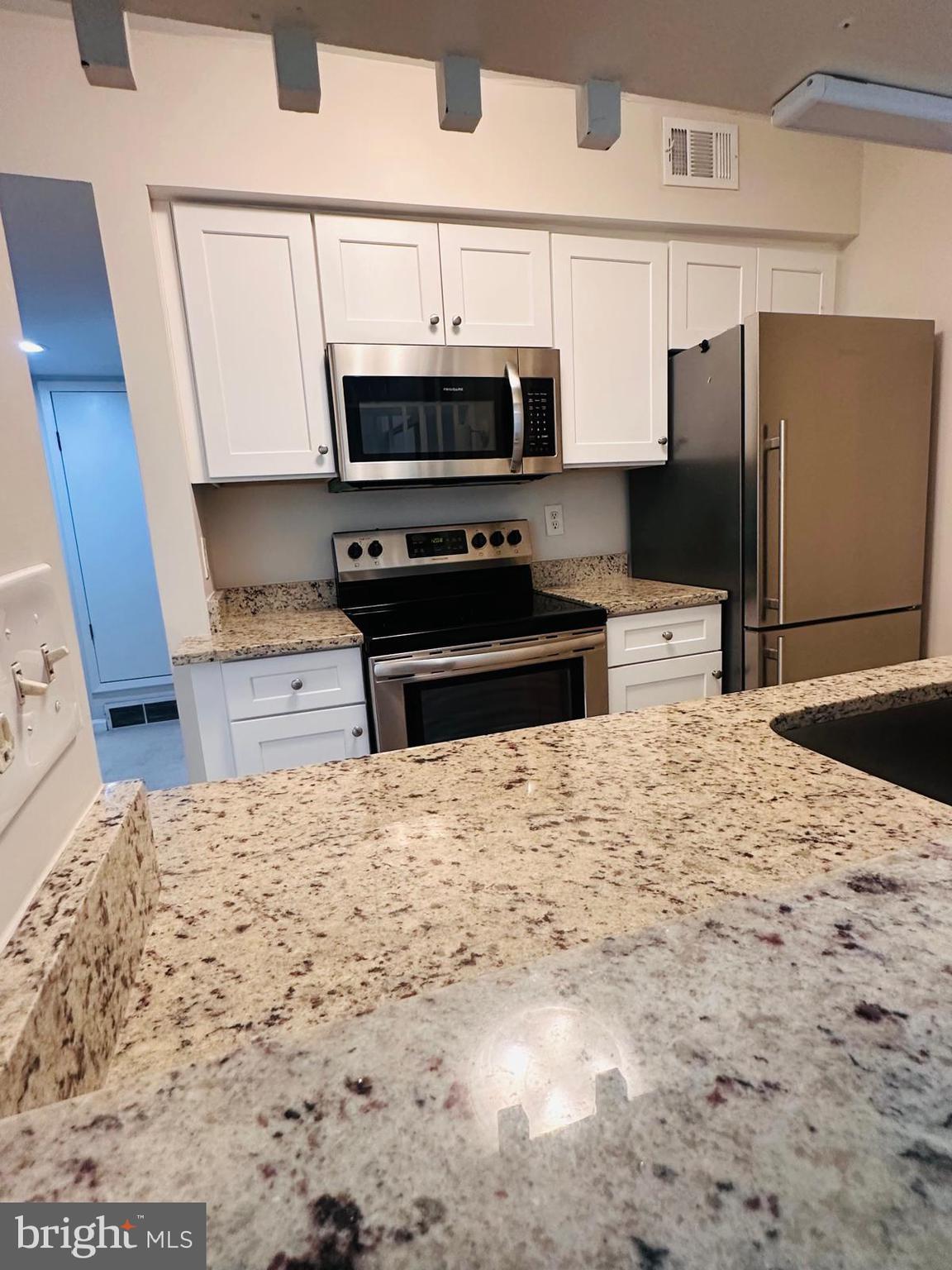 5821 E Royal Ridge Drive, Unit E Springfield, VA 22152 - Photo 15 of 25