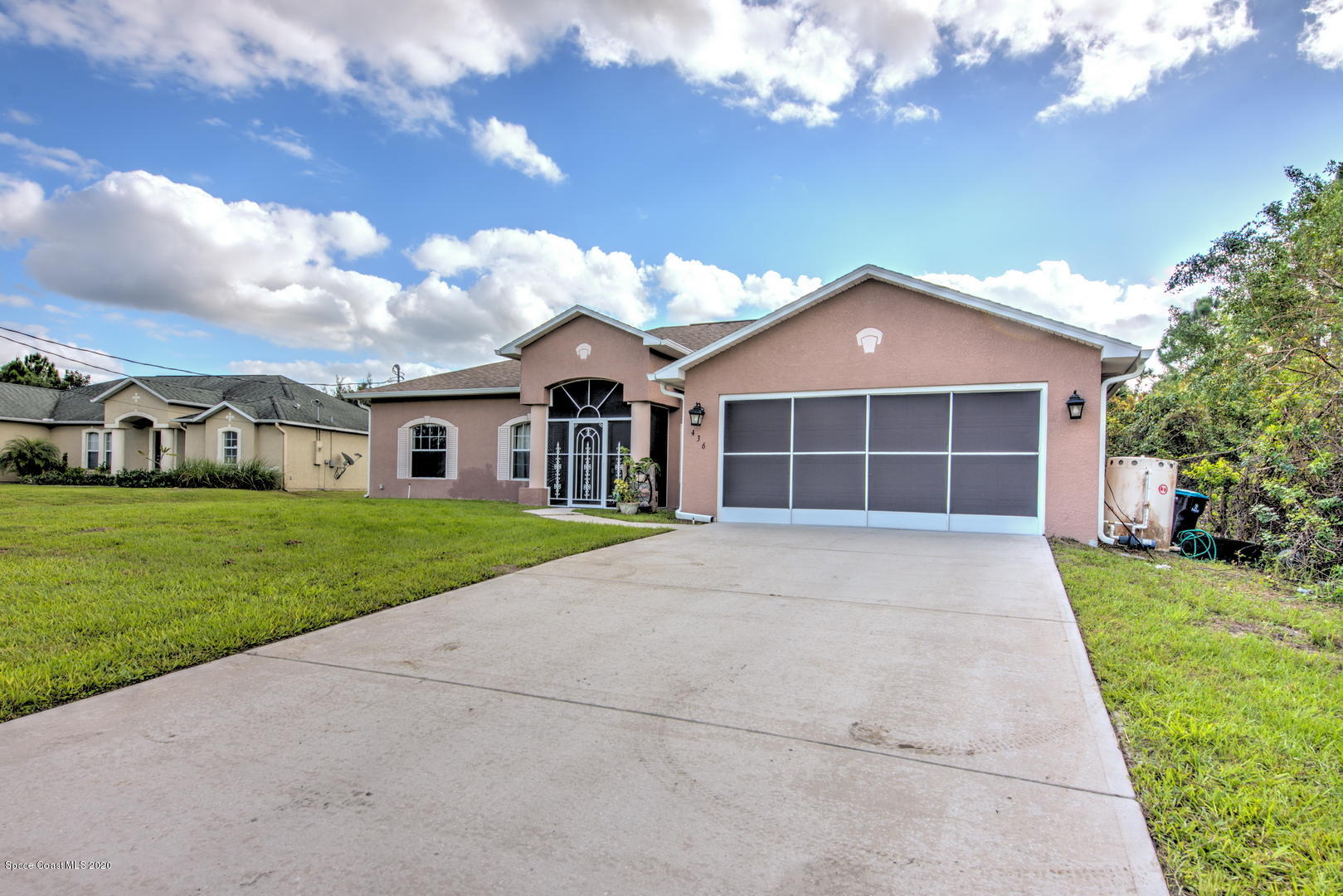 436 Larino Road Southwest Palm Bay, FL 32908 - Photo 2 of 48 Screened Garage Door