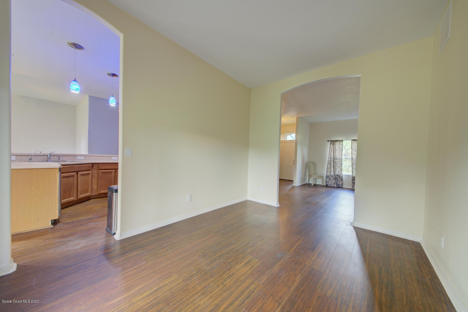 436 Larino Road Southwest Palm Bay, FL 32908 - Photo 17 of 48 Formal Dining Room off Kitchen