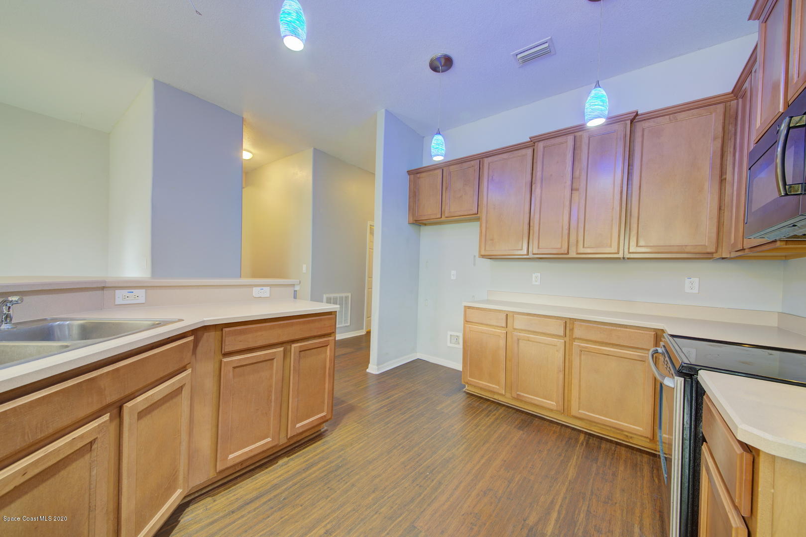 436 Larino Road Southwest Palm Bay, FL 32908 - Photo 21 of 48 Kitchen with lots of Cabinets