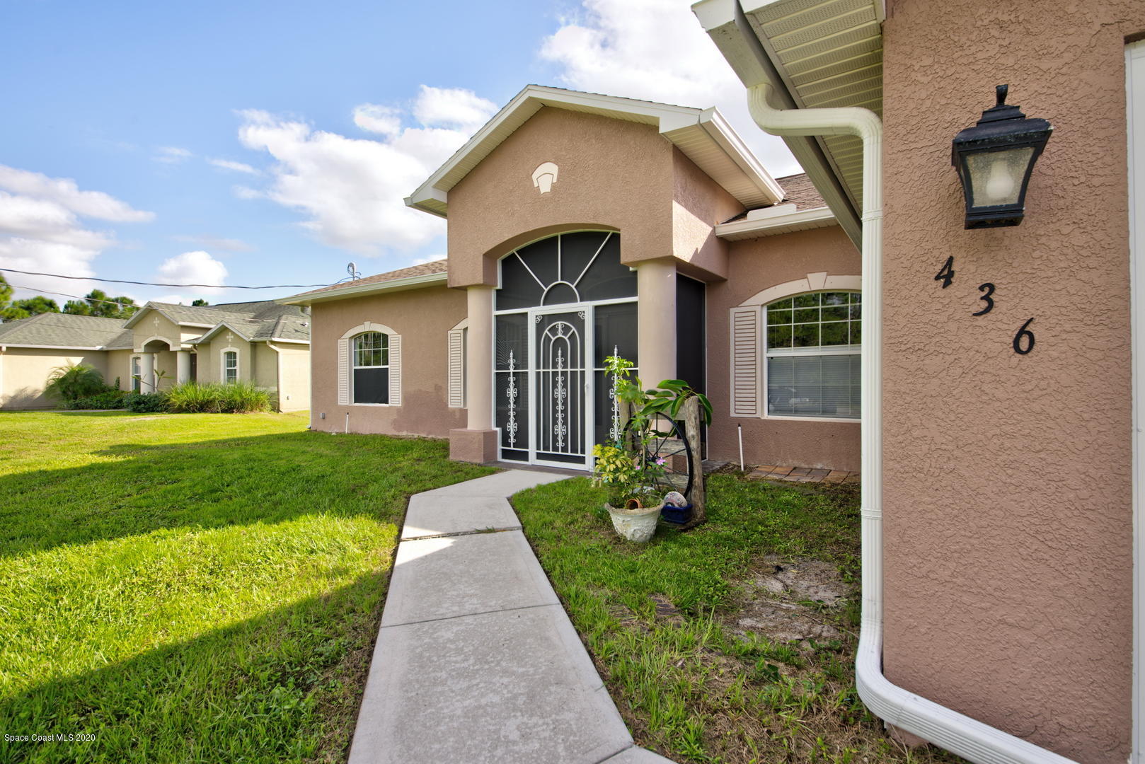 436 Larino Road Southwest Palm Bay, FL 32908 - Photo 4 of 48 Front Walkway