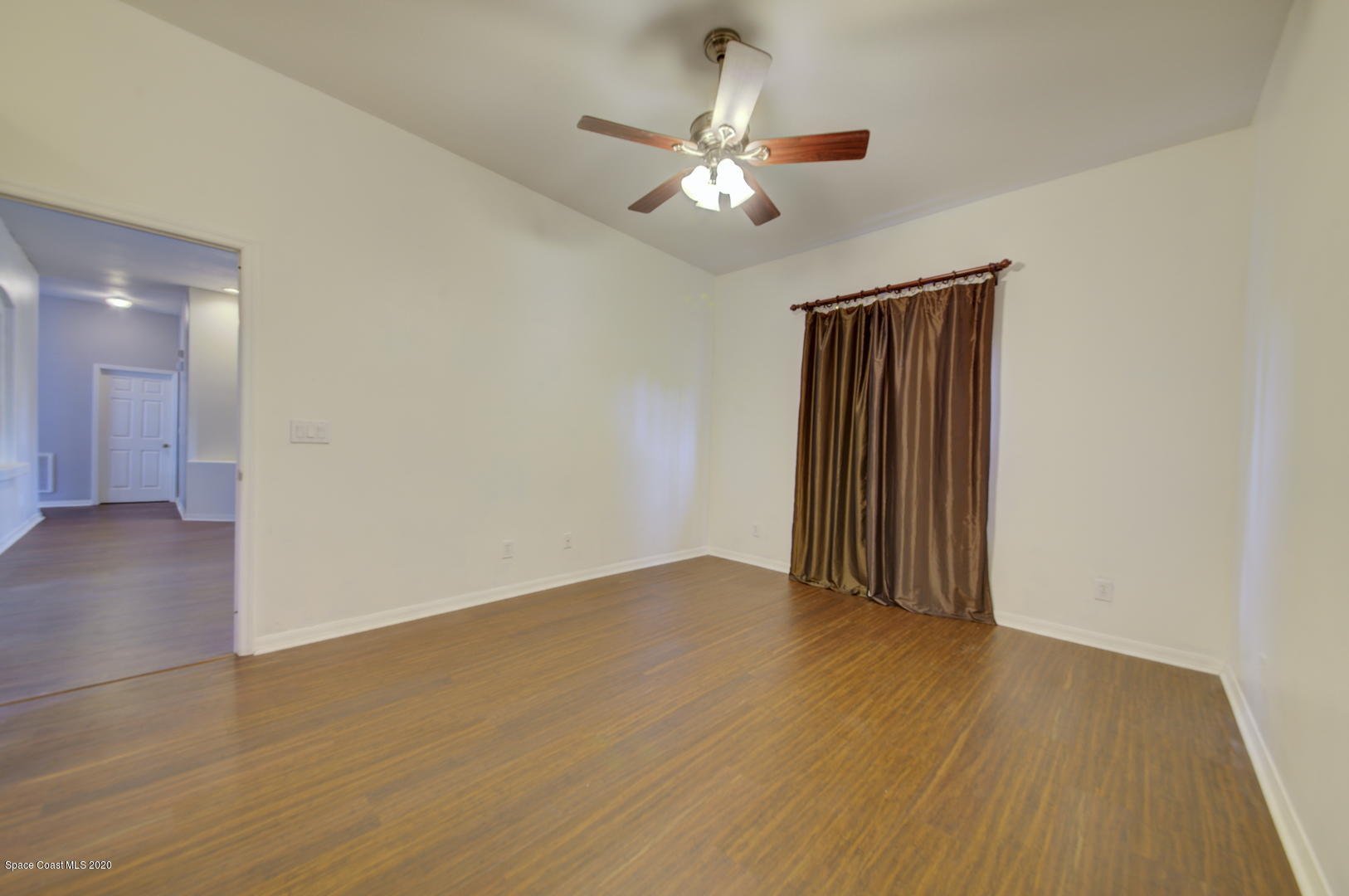 436 Larino Road Southwest Palm Bay, FL 32908 - Photo 32 of 48 Master Bedroom Wood Laminate Floor