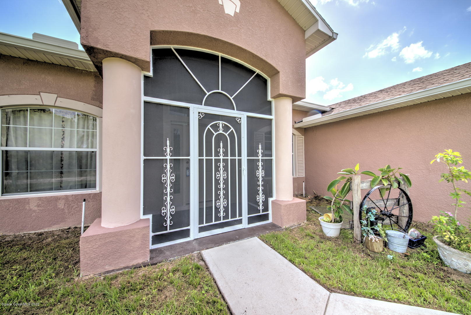 436 Larino Road Southwest Palm Bay, FL 32908 - Photo 5 of 48 Screen Enclosed Front Entry