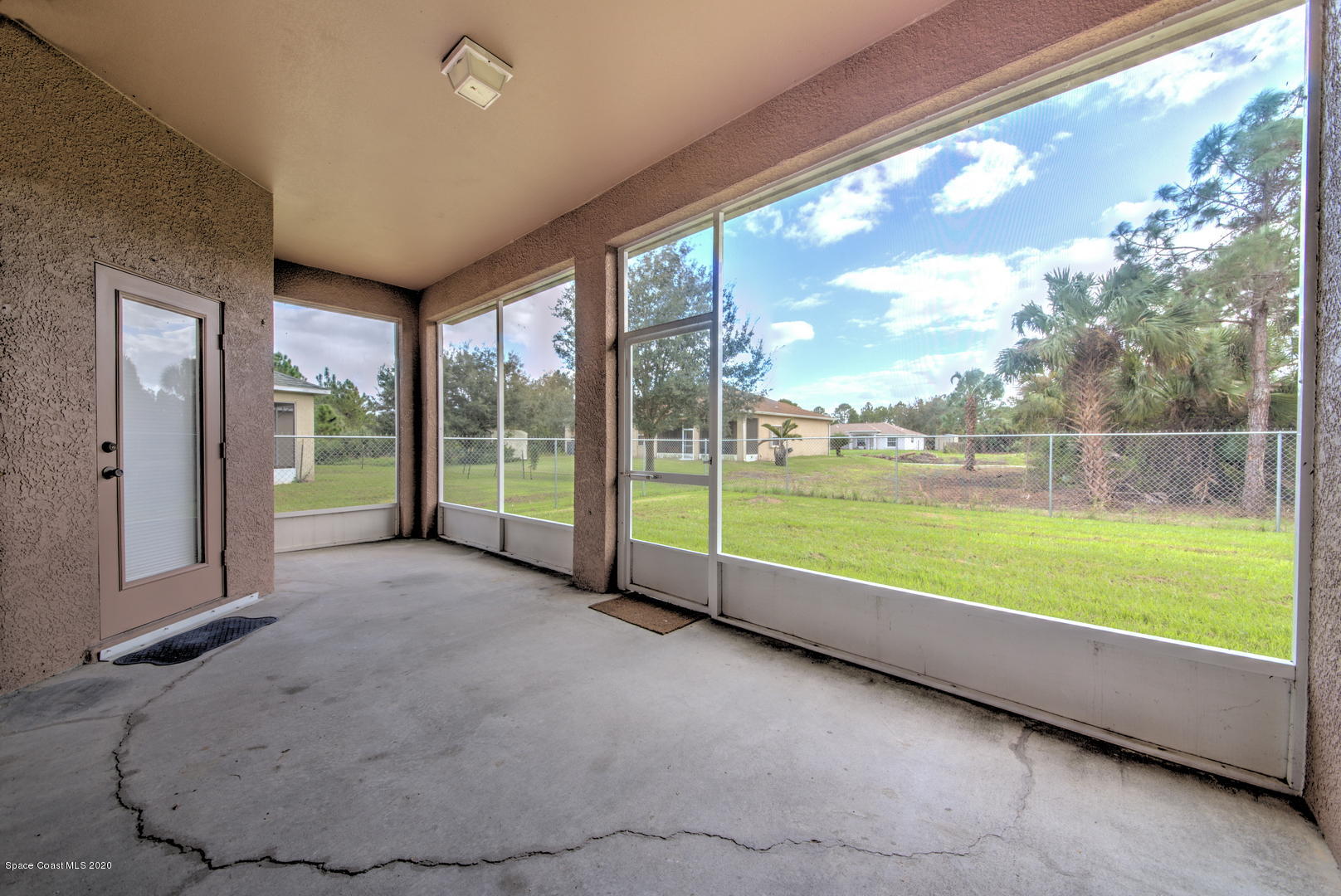 436 Larino Road Southwest Palm Bay, FL 32908 - Photo 43 of 48 Screen Enclosed Back Patio