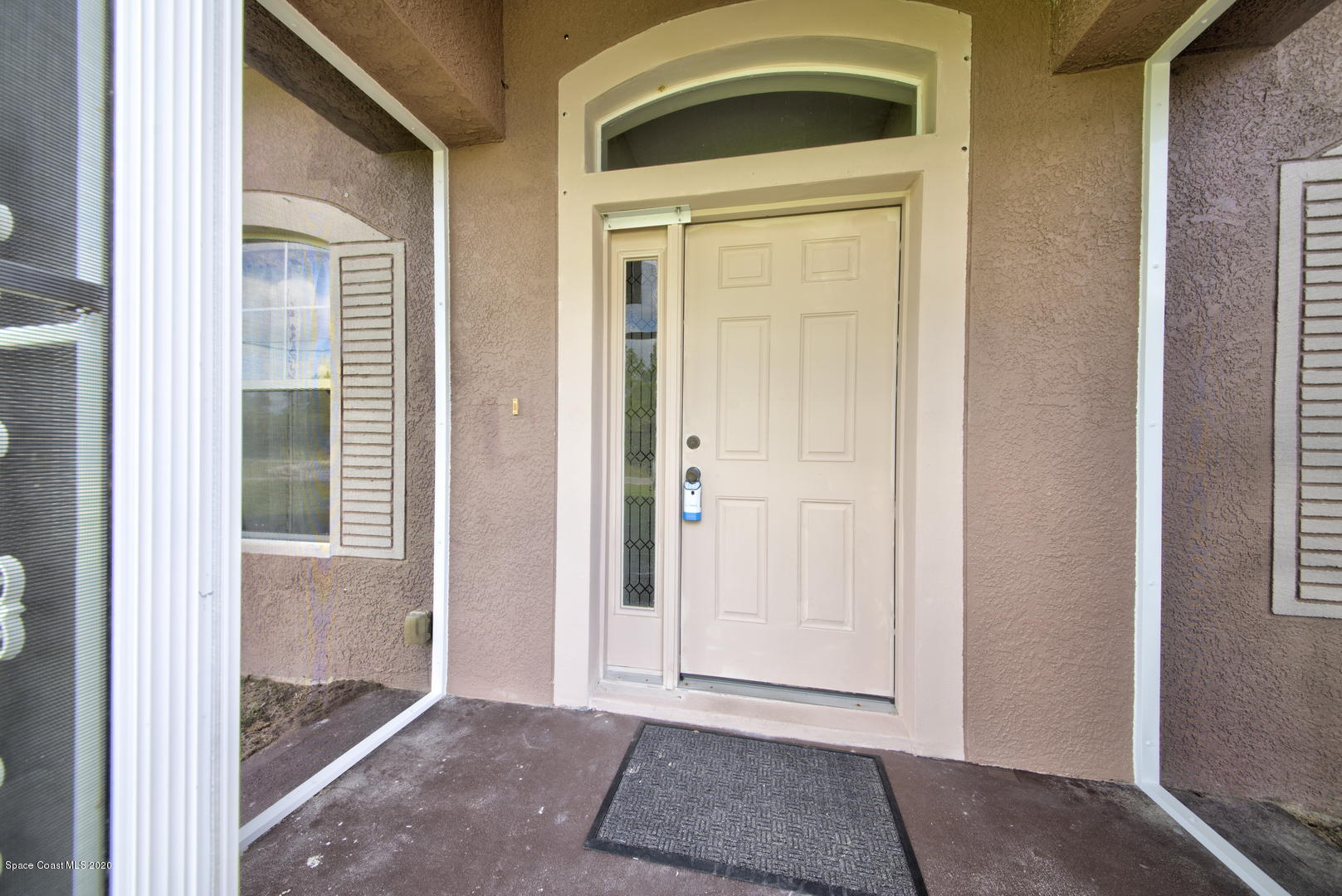 436 Larino Road Southwest Palm Bay, FL 32908 - Photo 6 of 48 Screen Enclosed Porch