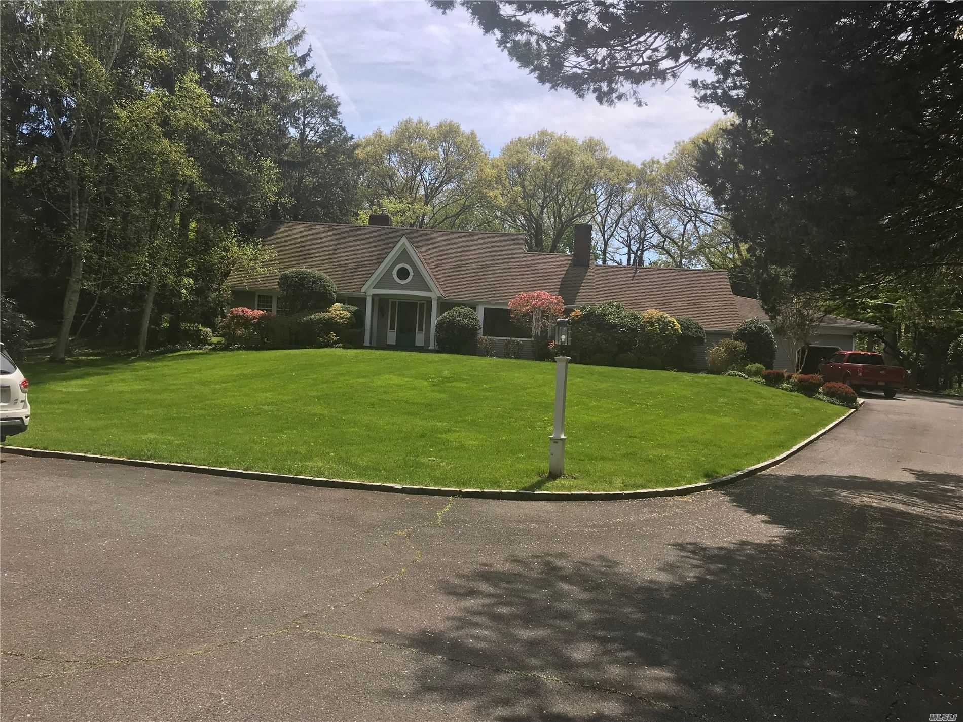 1574 Laurel Hollow Road Syosset, NY 11791 - Photo 1 of 1 an aerial view of a house
