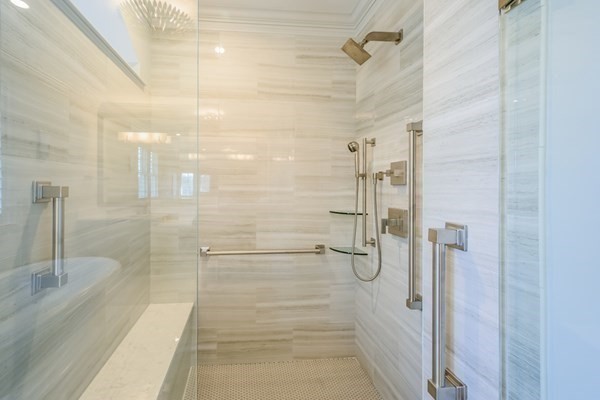 64 Simons Road, Unit F Mashpee, MA 02649 - Photo 17 of 33 a bathroom with a shower