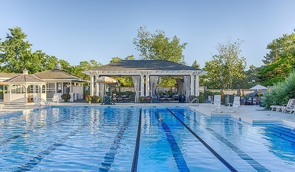 64 Simons Road, Unit F Mashpee, MA 02649 - Photo 29 of 33 a view of swimming pool with seating space