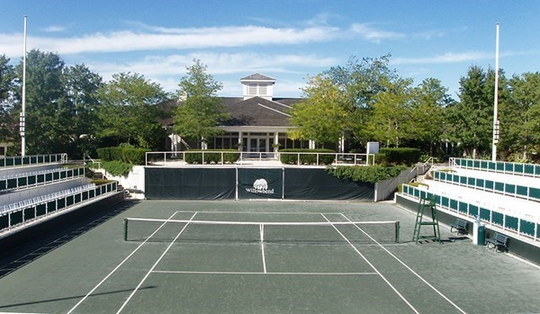 64 Simons Road, Unit F Mashpee, MA 02649 - Photo 30 of 33 a view of a tennis ground with furniture in front of it