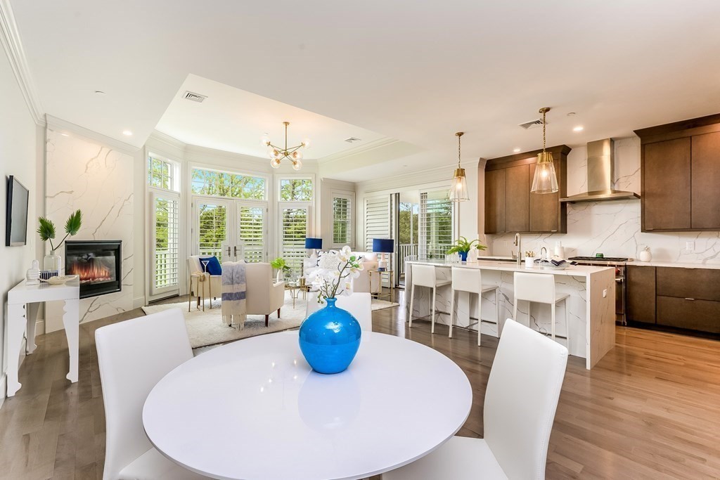 64 Simons Road, Unit F Mashpee, MA 02649 - Photo 8 of 33 a view of a dining room with furniture