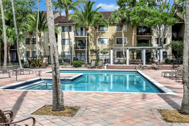 a view of a house with swimming pool