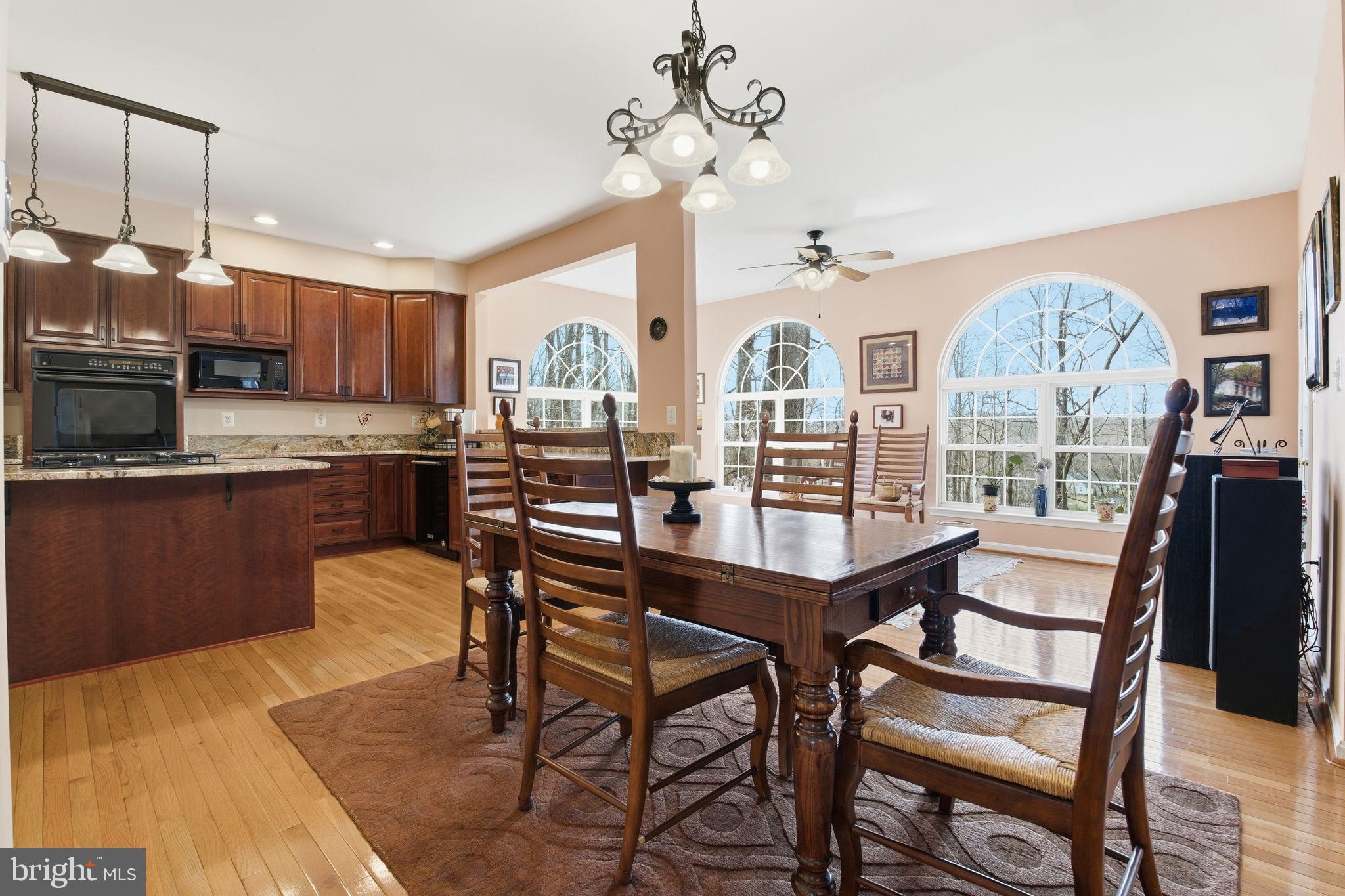 5534 Nutwell Sudley Road Deale, MD 20751 - Photo 12 of 58 Bright and inviting dining space with views.