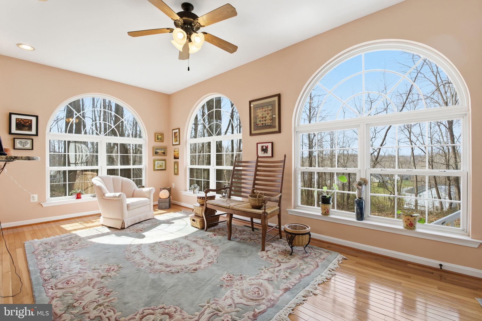 5534 Nutwell Sudley Road Deale, MD 20751 - Photo 13 of 58 Sunlit retreat with elegant arched windows.