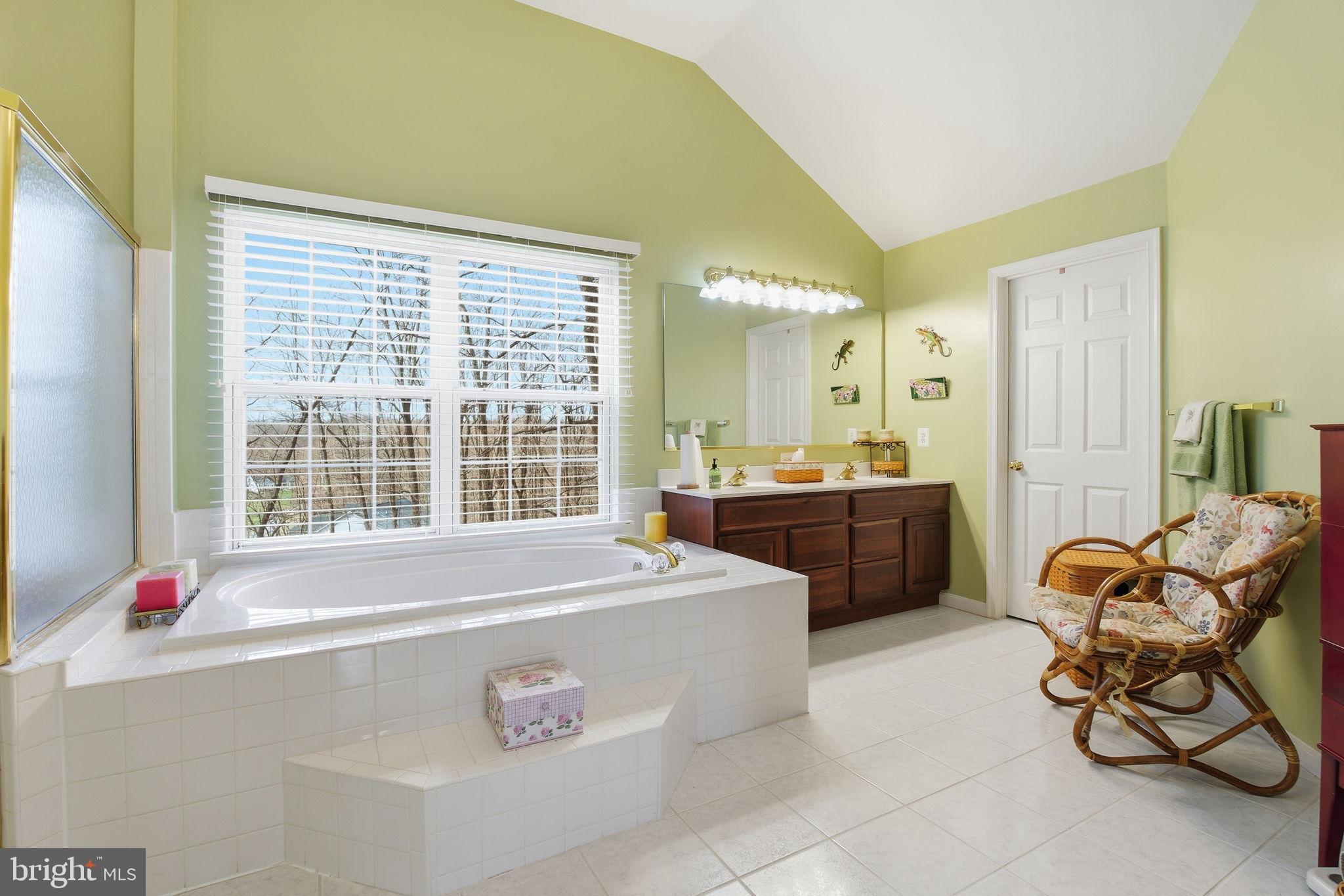 5534 Nutwell Sudley Road Deale, MD 20751 - Photo 35 of 58 Serene bathroom with natural light and views.