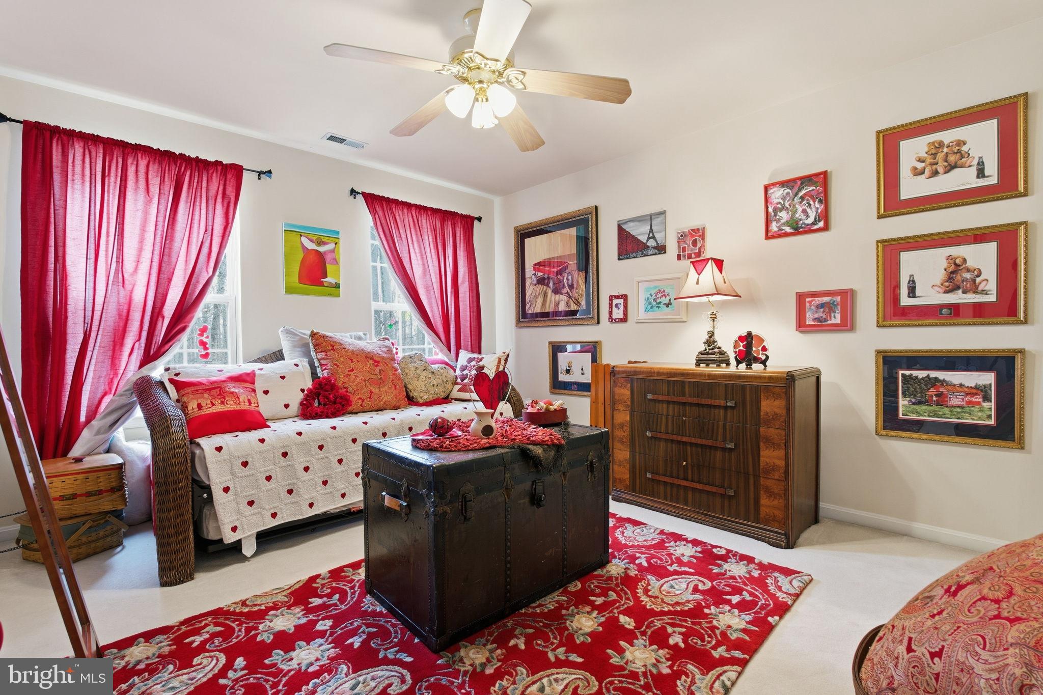 5534 Nutwell Sudley Road Deale, MD 20751 - Photo 40 of 58 Charming room with vibrant red accents.