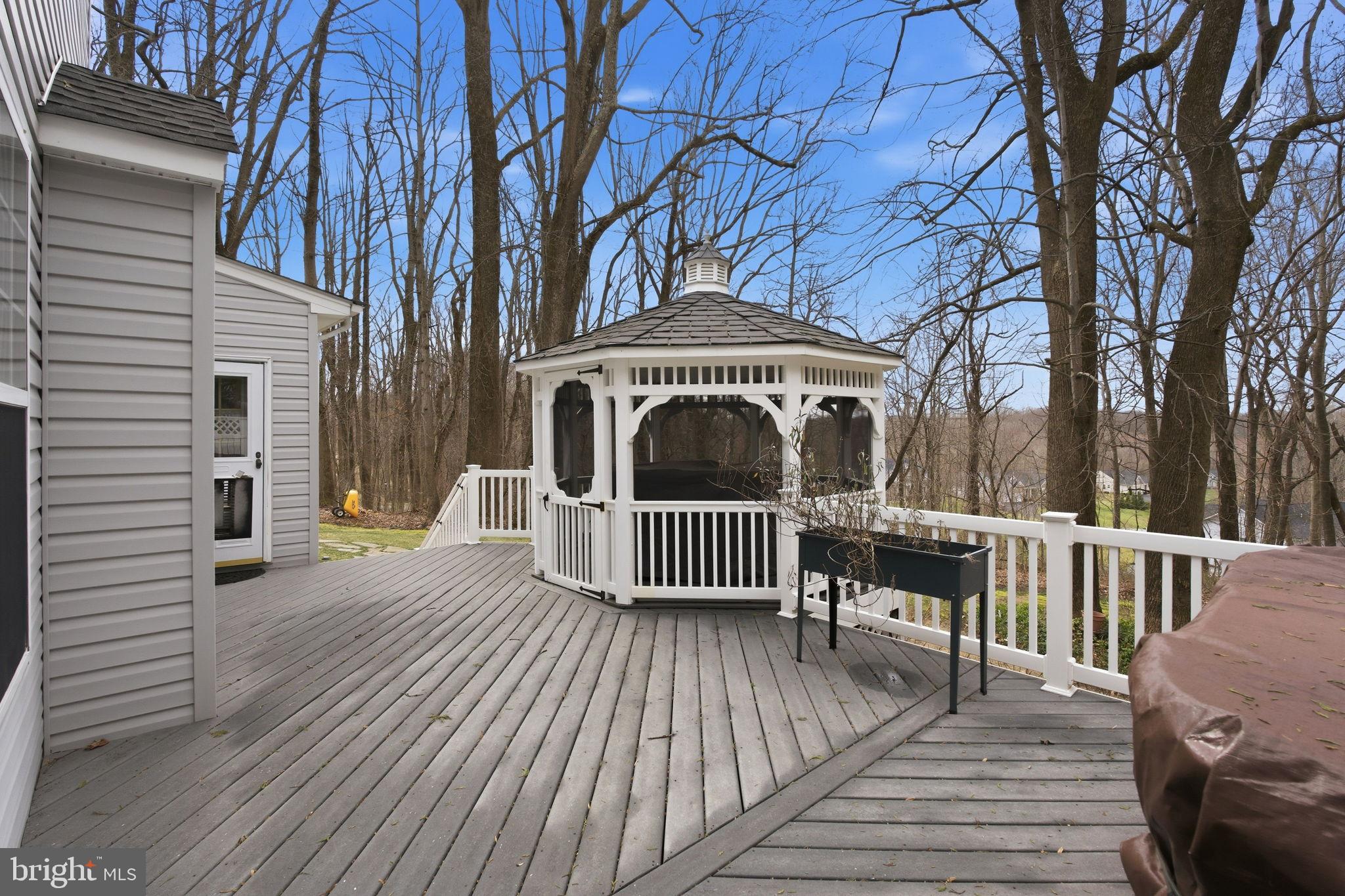 5534 Nutwell Sudley Road Deale, MD 20751 - Photo 52 of 58 Serene deck with gazebo amid nature.
