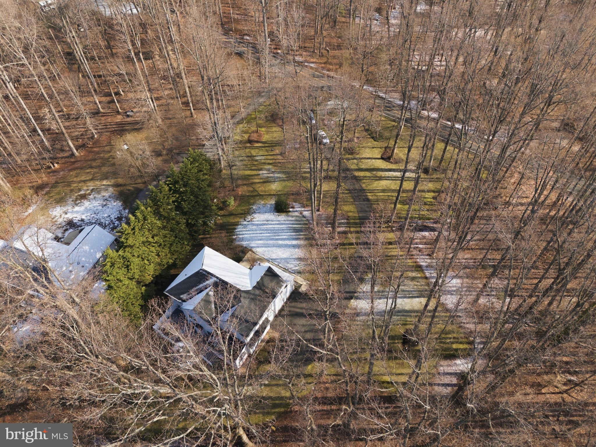 5534 Nutwell Sudley Road Deale, MD 20751 - Photo 54 of 58 Serene woodland retreat in winter's embrace.