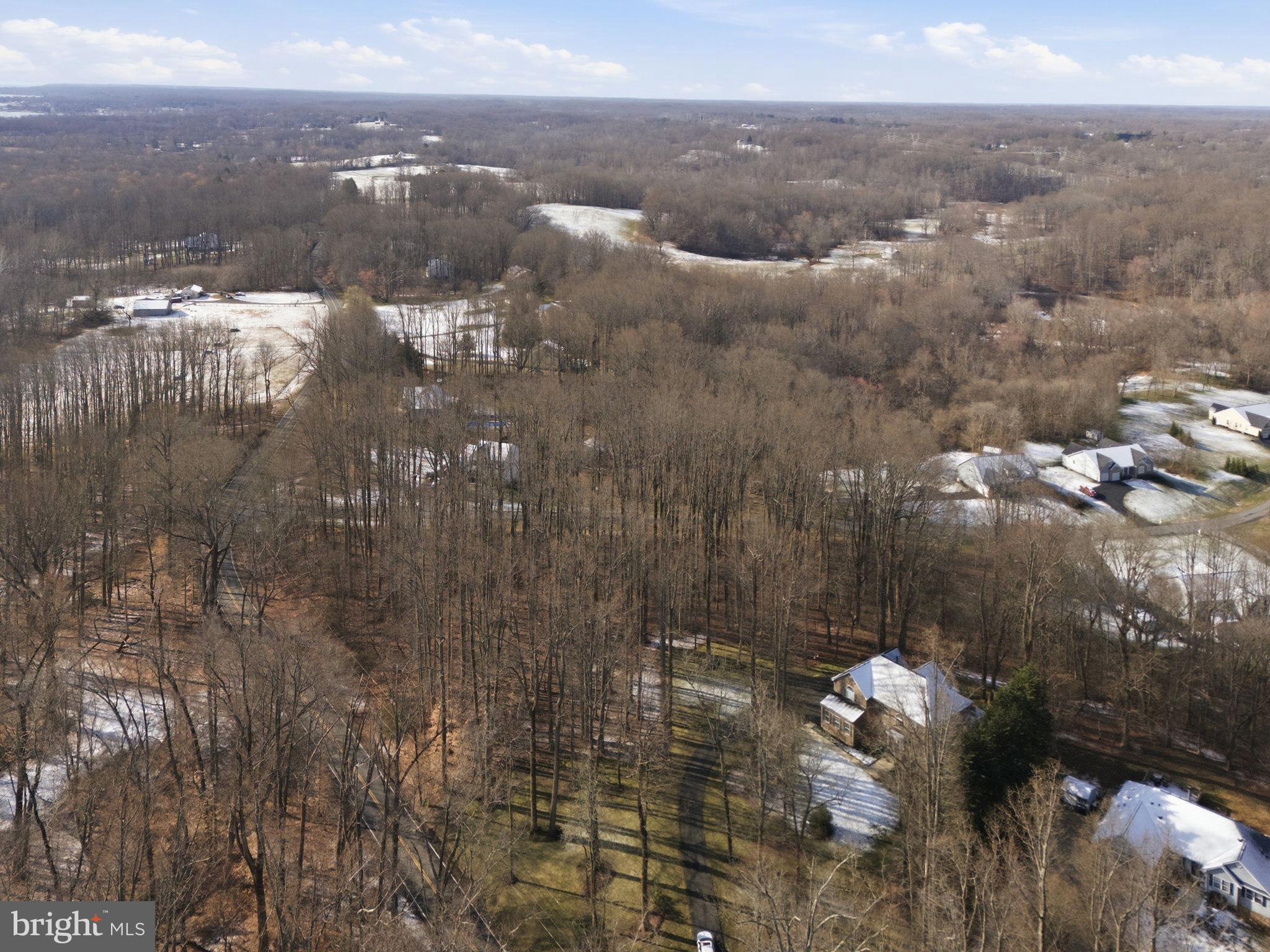 5534 Nutwell Sudley Road Deale, MD 20751 - Photo 56 of 58 Serene wooded landscape with distant homes.