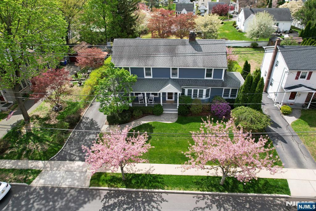 6 Long Avenue Mahwah, NJ 07430 - Photo 2 of 49 an aerial view of a house with a garden and lake view