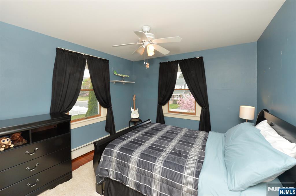 6 Long Avenue Mahwah, NJ 07430 - Photo 27 of 49 a bedroom with a bed and a window