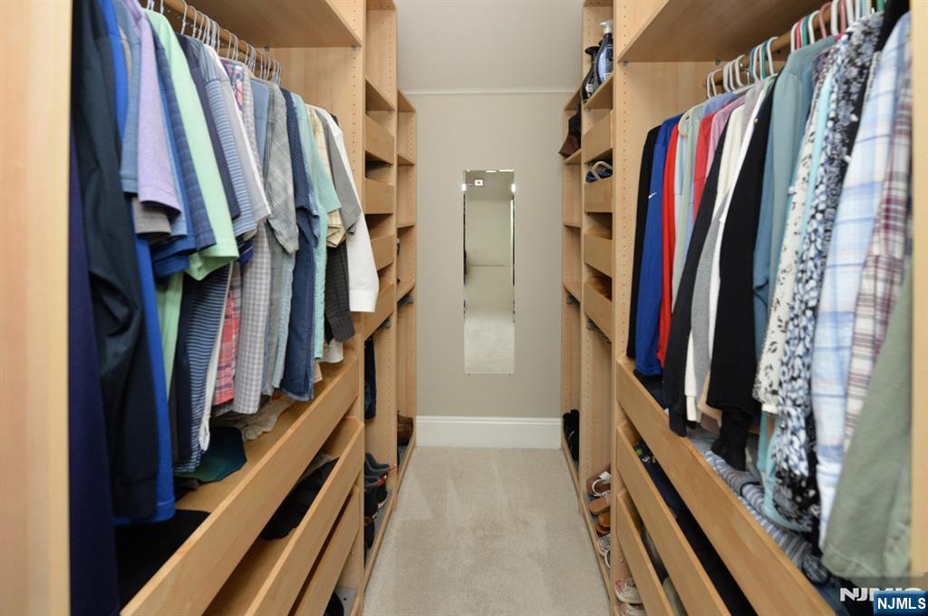 6 Long Avenue Mahwah, NJ 07430 - Photo 30 of 49 a view of walk in closet with clothes and shoes