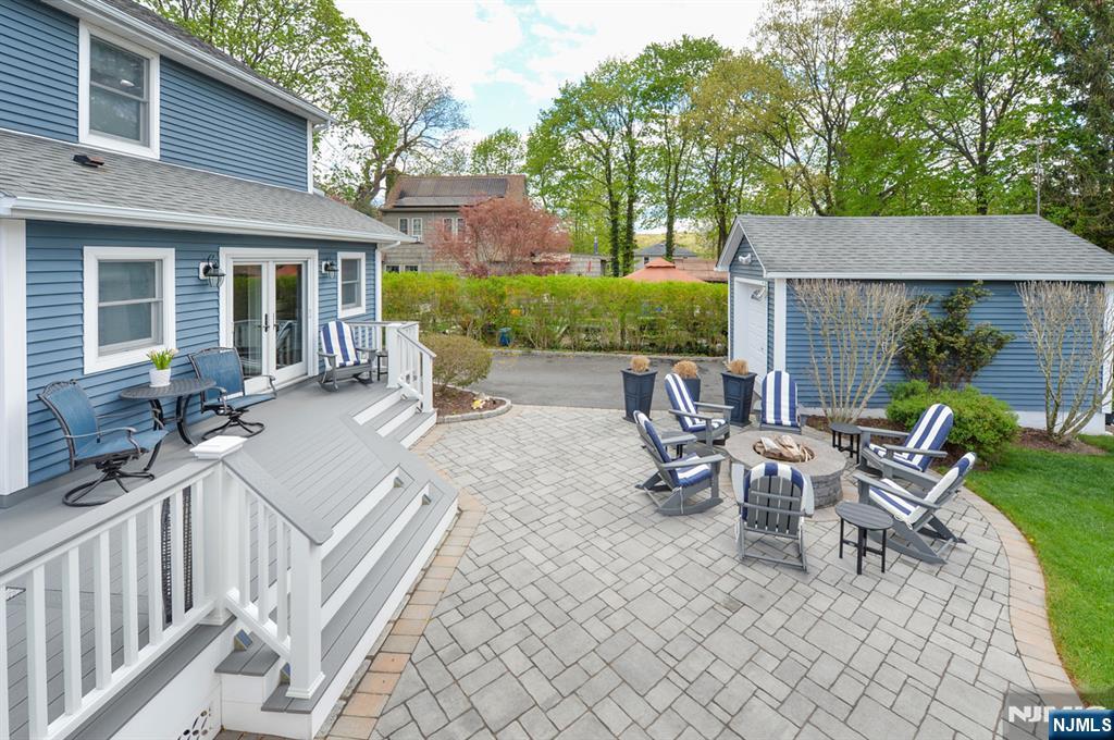 6 Long Avenue Mahwah, NJ 07430 - Photo 45 of 49 a view of a house with backyard sitting area and garden