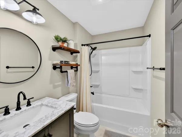 a workspace with wooden floor and a window