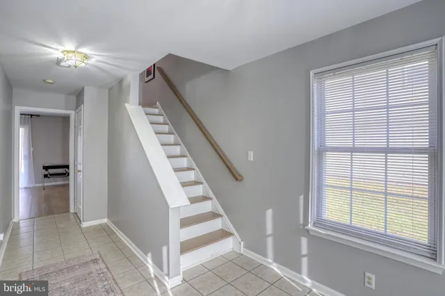 a view of entryway and hall with a window