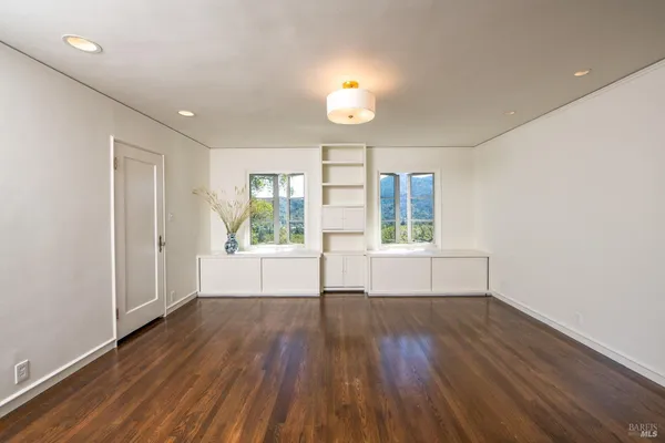 a view of a room that has a window in it