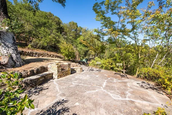 a view of a backyard of the house