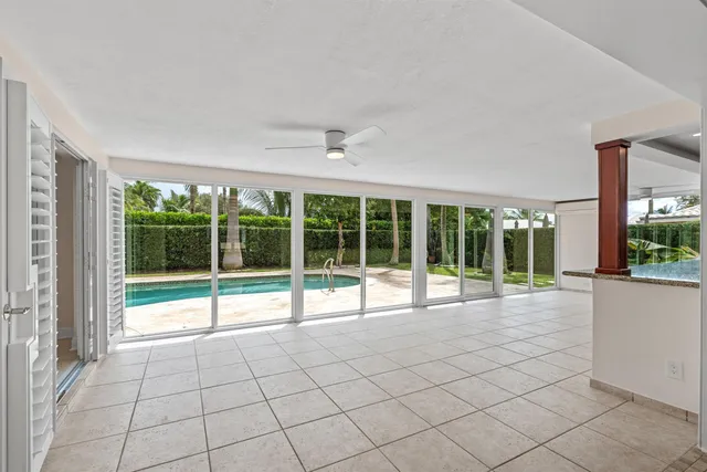 a view of an empty room with a large window
