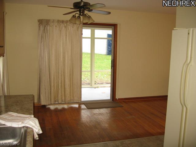 361 Abbyshire Road Akron, OH 44319 - Photo 17 of 25 KITCHEN TO DINING AREA AND SUNROOM