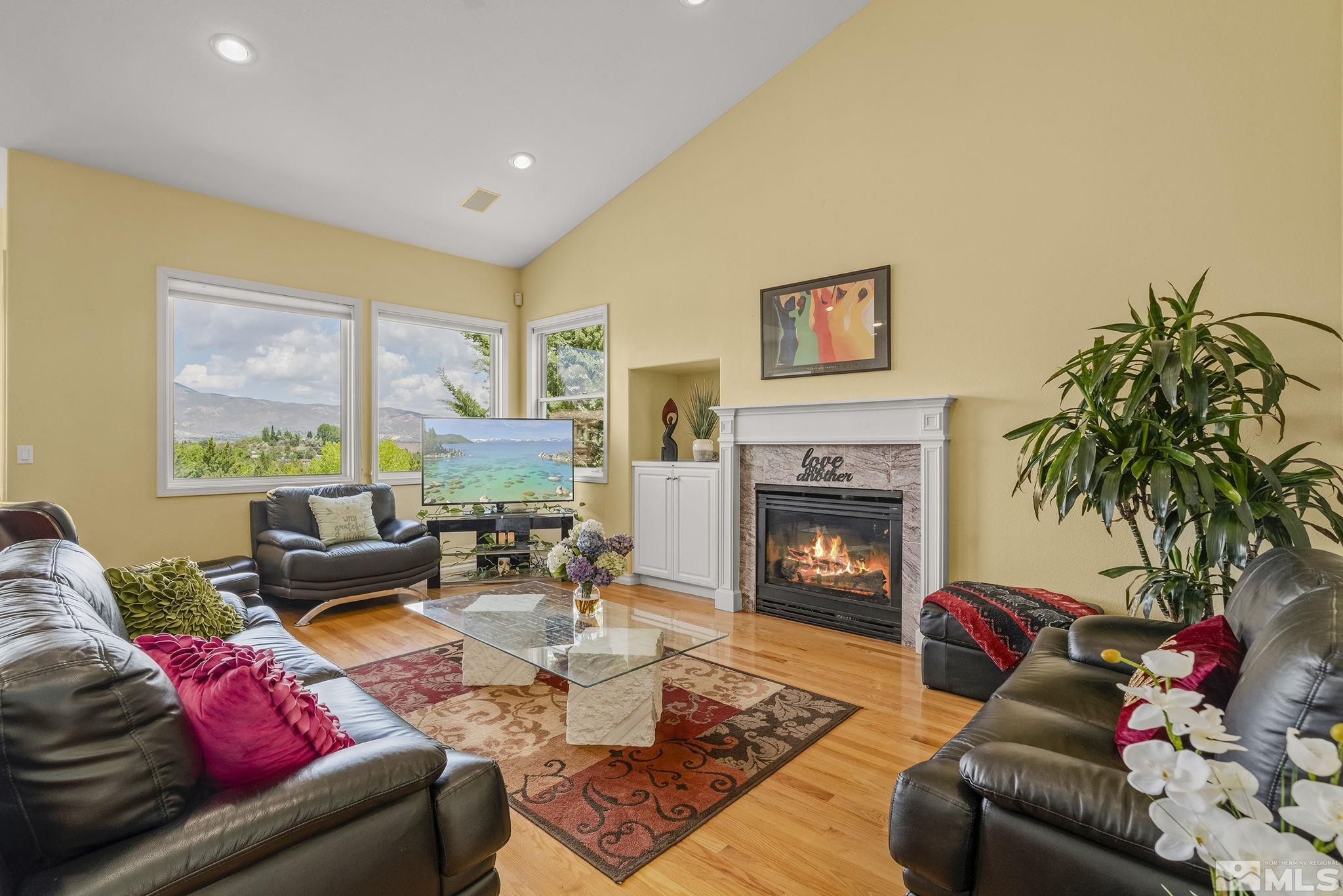 29 Sawbuck Road Reno, NV 89519 - Photo 8 of 40 a living room with furniture and a fireplace