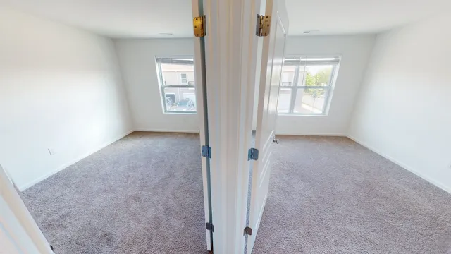 an empty room with windows