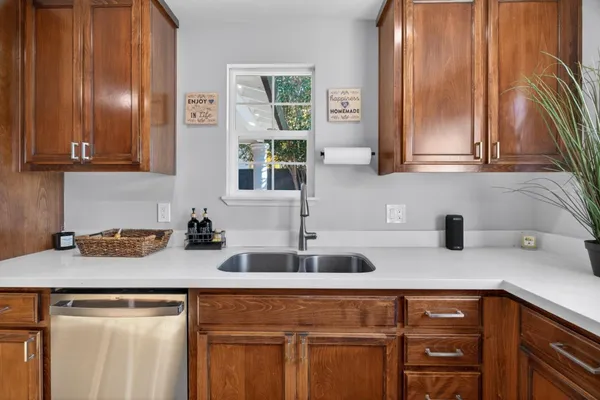 a kitchen with a sink and cabinets