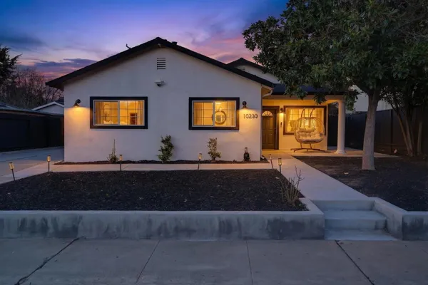 a house view with a garden space