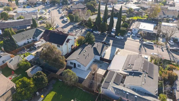 an aerial view of a city with lots of residential buildings
