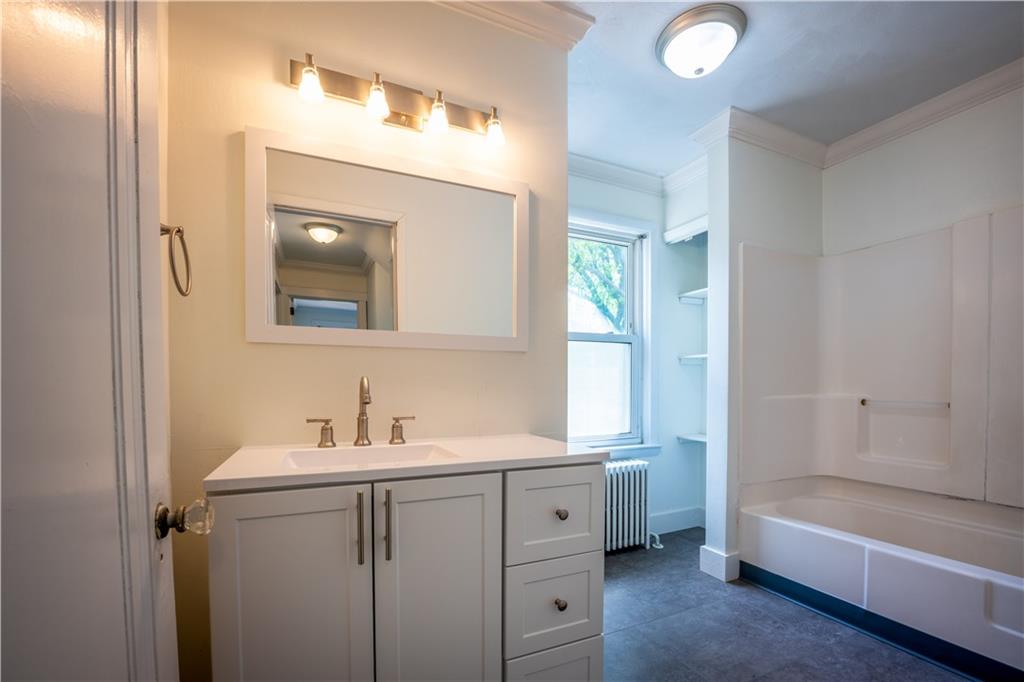 6418 Landview Road Pittsburgh, PA 15217 - Photo 13 of 24 a bathroom with a tub a sink and mirror