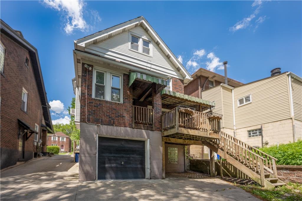 6418 Landview Road Pittsburgh, PA 15217 - Photo 24 of 24 a front view of a house with a garage