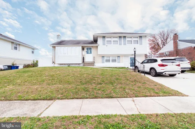 a house view with a garden space