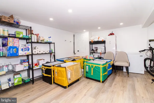 a room with furniture and a wooden floor