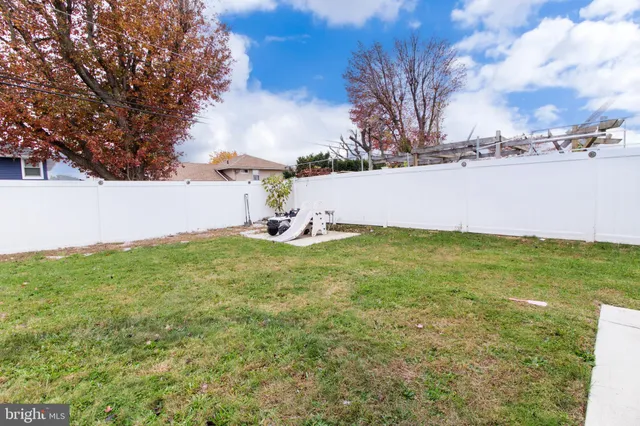 a view of a lake with a building in the background